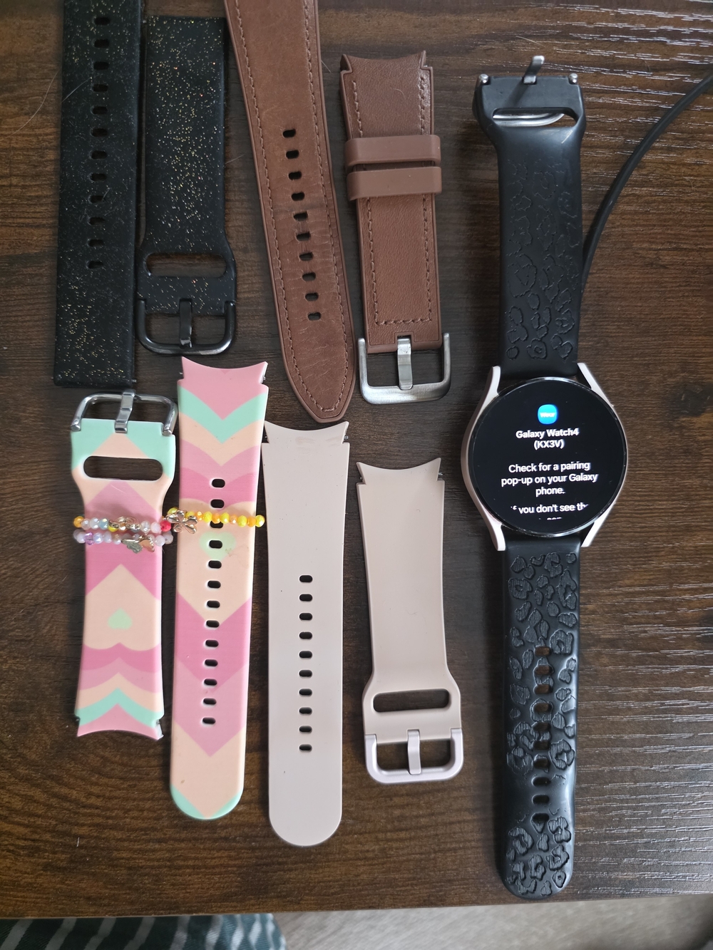 Samsung Galaxy Watch 4 with Black Cheetah Strap and 4 Extra Bands